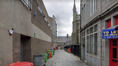 Man in hospital and three others arrested after street attack in Aberdeen