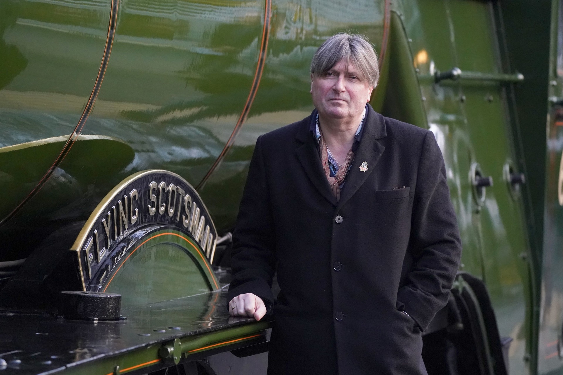 Poet Laureate Simon Armitage rode the locomotive to find inspiration for his poem (Andrew Milligan/PA) 