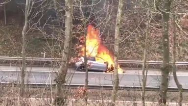 Car bursts into flames on M90 in Fife as smoke billows across road