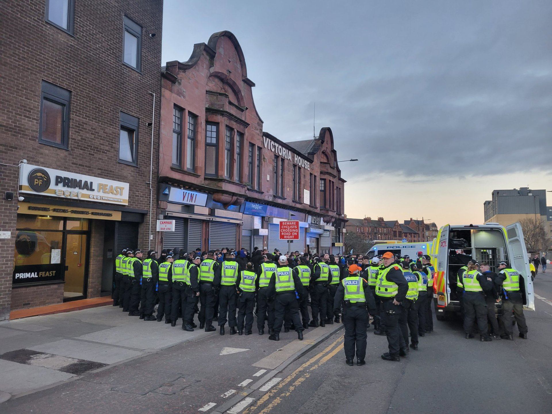 Police surround masked fans in Victoria Road (Rory MacLean)