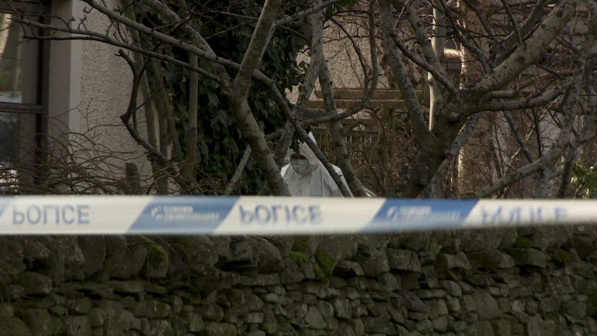 A police cordon was established around a home in Gattonside, a small village east of Galashiels town on the opposite side of the River Tweed to Melrose.