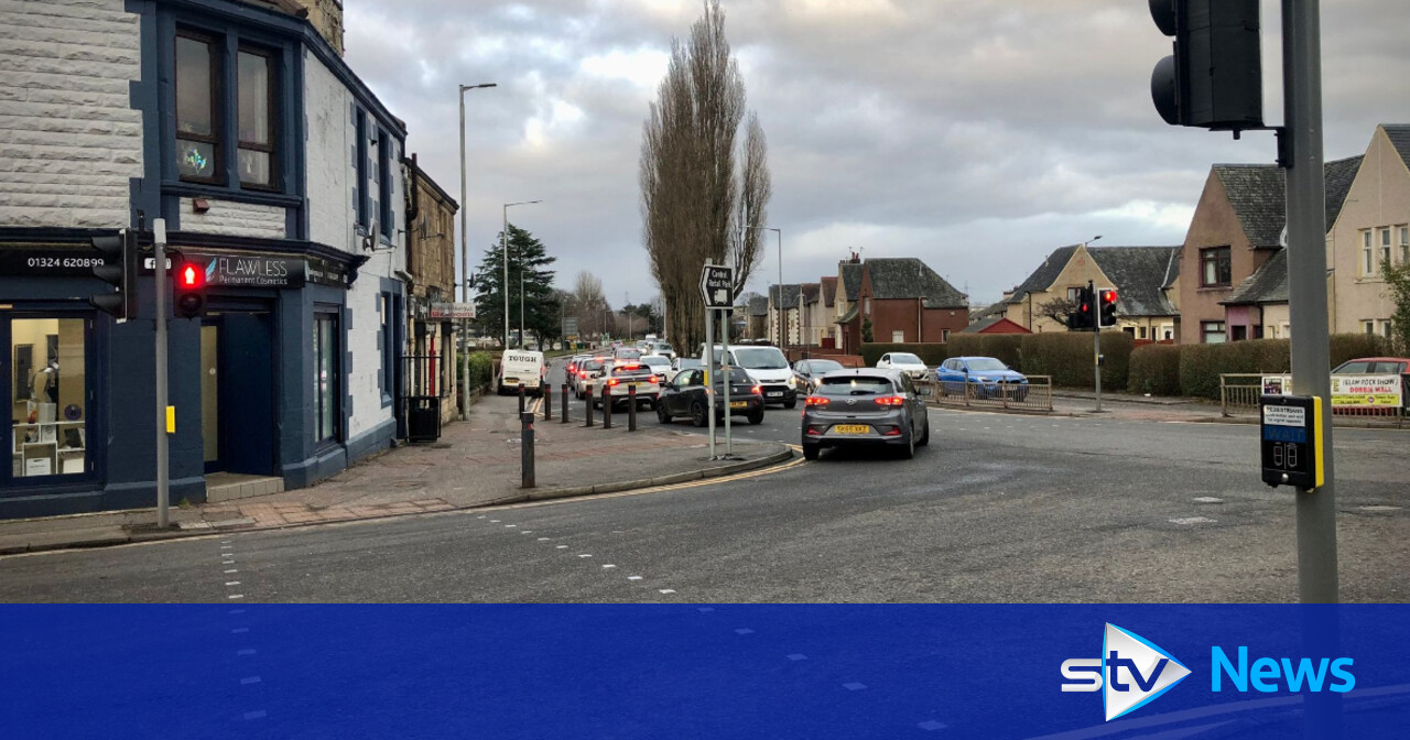 Driver in hospital after ambulance on emergency call crashes into car