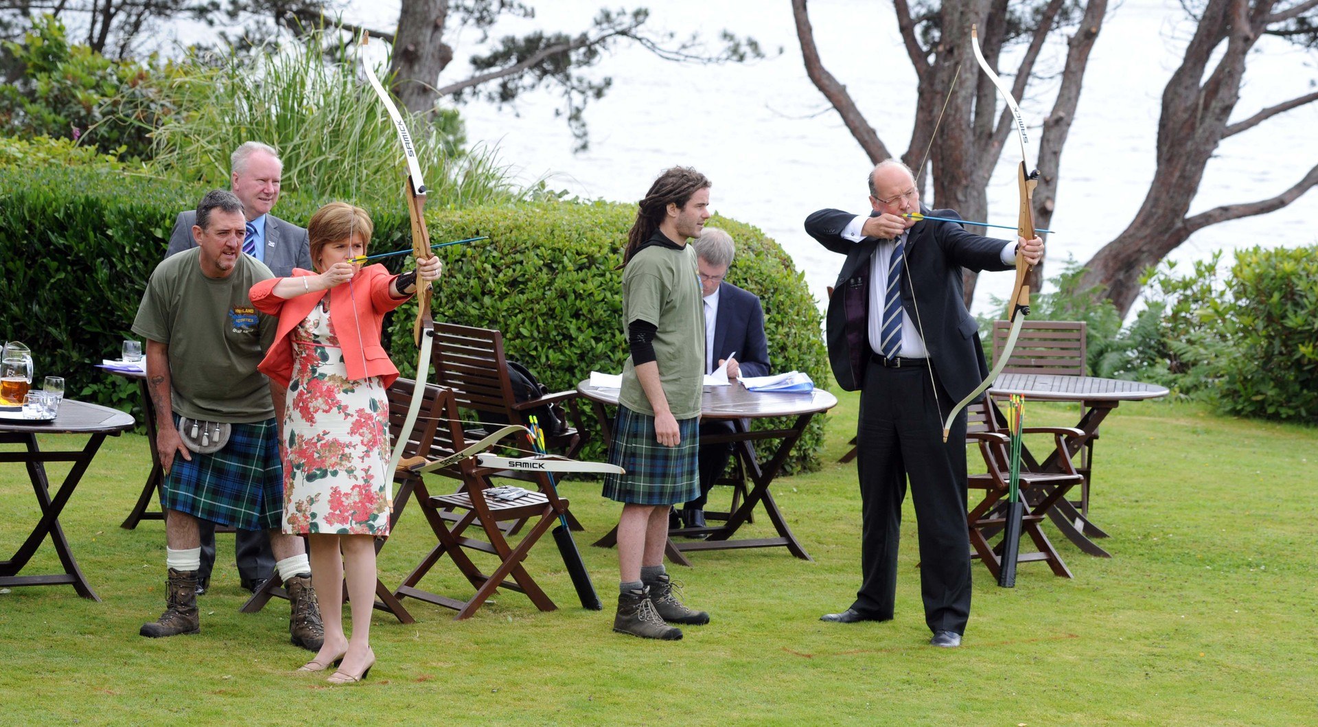 Then deputy first minister Nicola Sturgeon and then finance secretary John Swinney take aim during an event to highlight the effect on Scottish tourism of the Disney-Pixar film Brave in 2012.