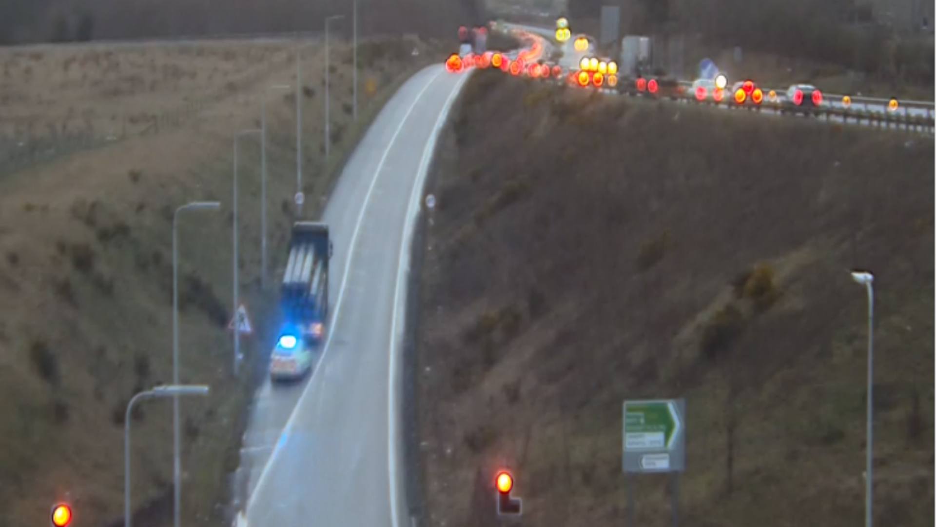 Traffic chaos after lorry sheds load onto A92 A90 on slip leading