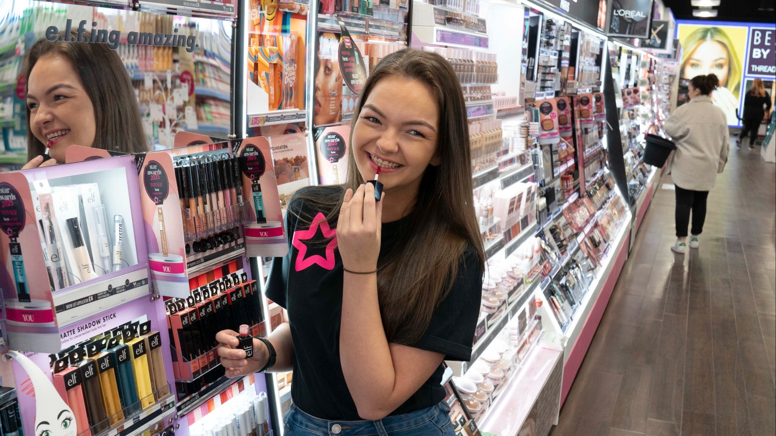 Superdrug staff member, Heather Anderson, 21, at the new Superdrug store in Braehead.