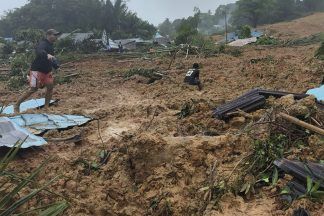 Dozens missing and at least 11 killed in deadly Indonesia landslide