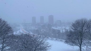 Commuters and pupils face disruption as heavy snow falls across Scotland