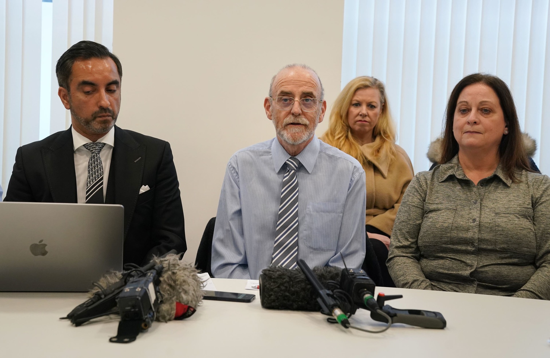 Lawyer Aamer Anwar alongside Alan Wightman, centre, and Helen Lee Keenan, right, from the Scottish members of the Covid-19 Bereaved Families for Justice group.