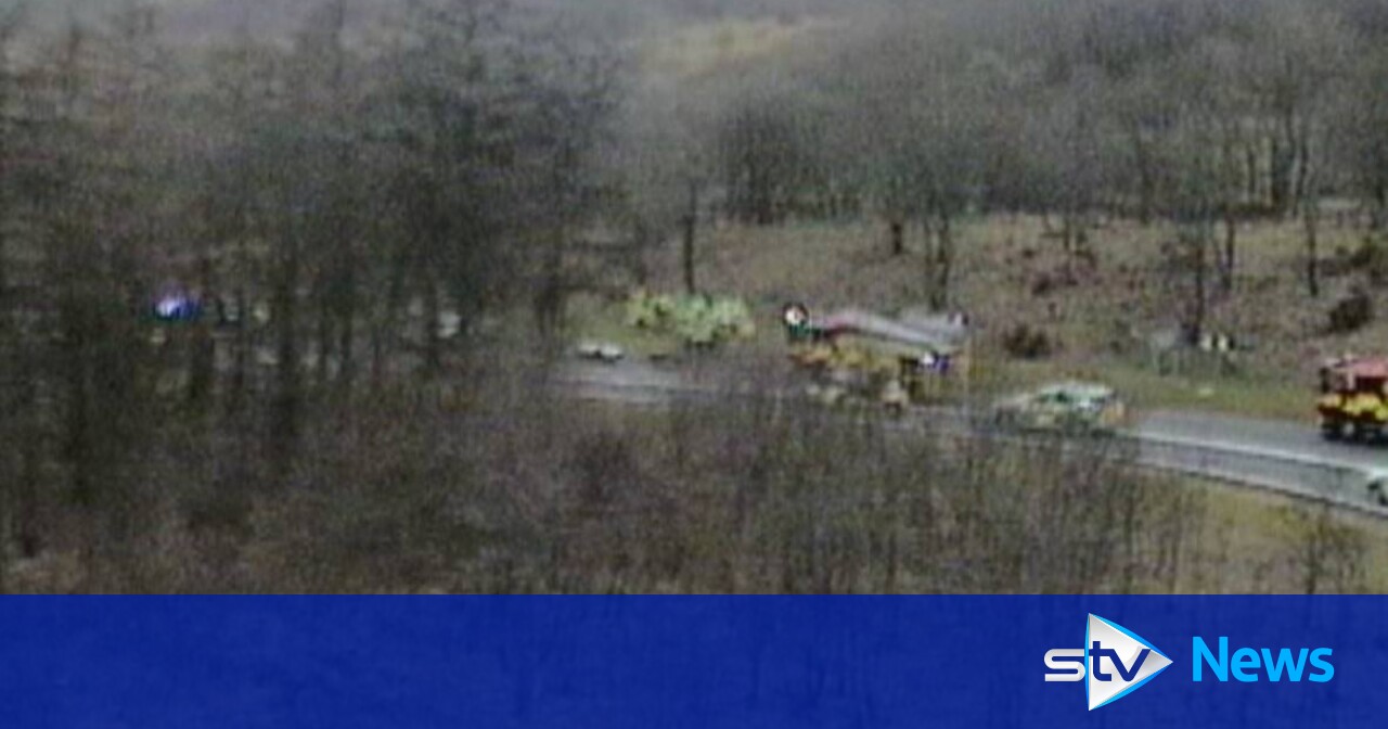Four people in hospital after car catches fire in crash on M80 near ...