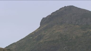 Murder trial hears woman said husband pushed her off hill