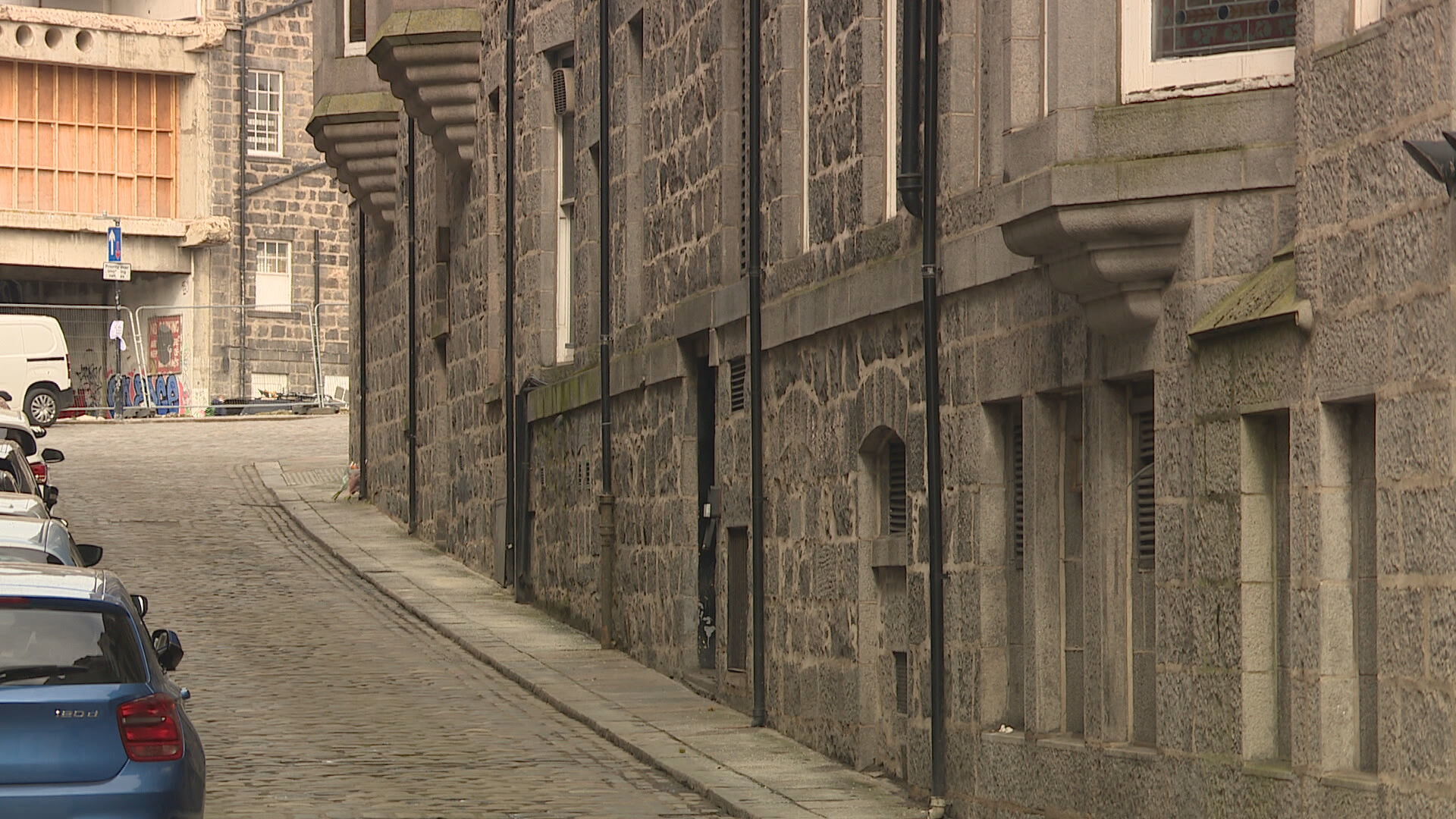 People have left tributes to the 50-year-old on Carmelite Lane. 