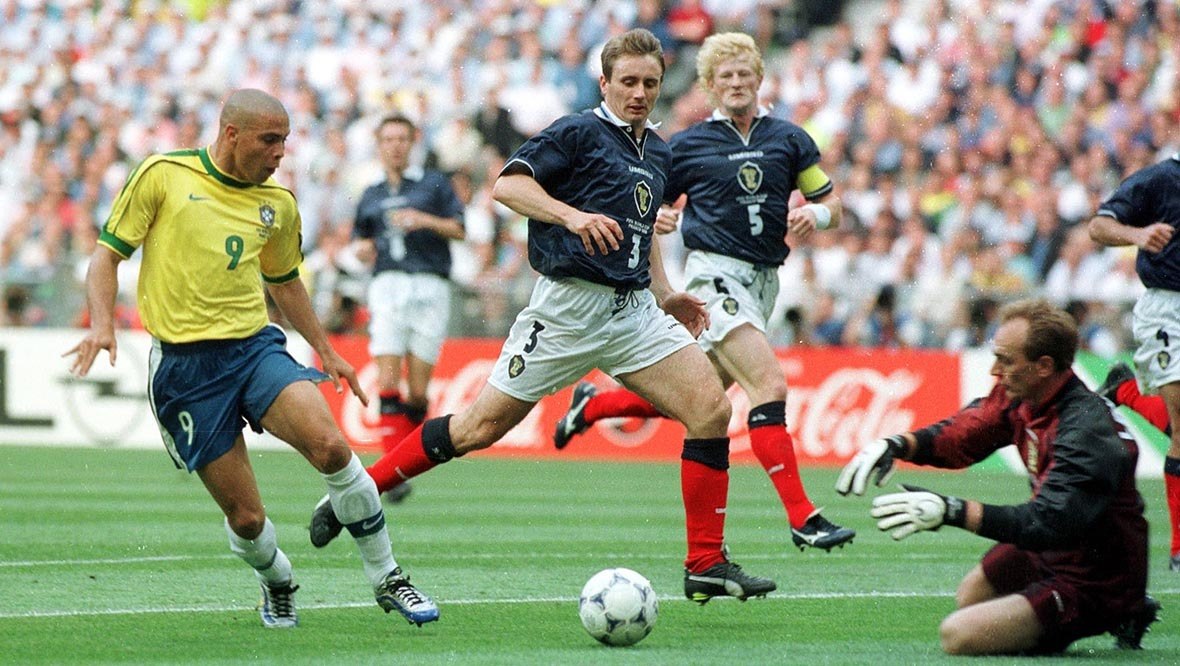 Ronaldo takes on Tom Boyd and Jim Leighton in the Stade de France.