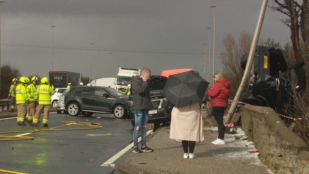 Woman and three men in hospital after 17vehicle crash sent car over