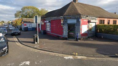 Motorbike covered in police tape stolen from outside Best One shop in Motherwell