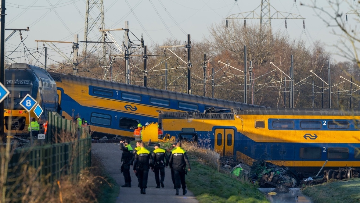 At least one dead and 30 injured after train derails near The Hague in Netherlands
