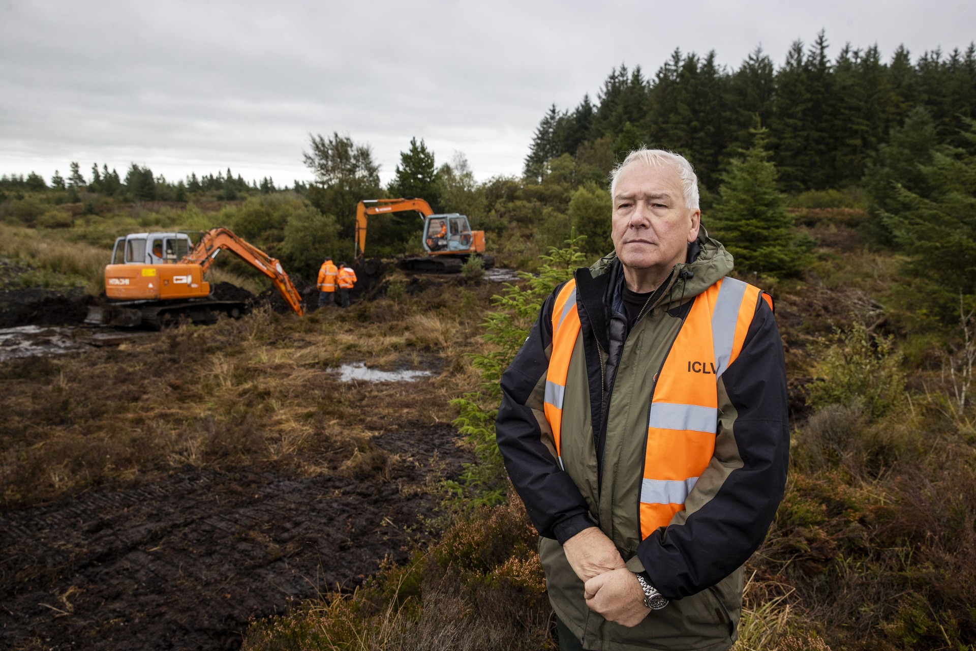 Jon Hill, of the Independent Commission for the Location of Victims’ Remains, stands besides excavators at Bragan bog near Emyvale in Co Monaghan.
