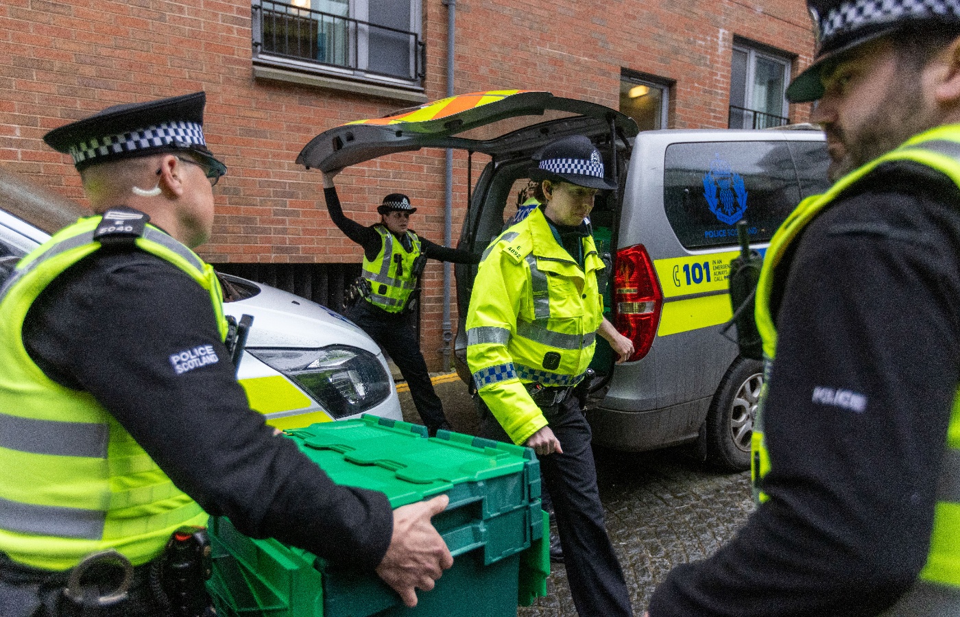 Police officers at the Scottish National Party's offices on April 5, 2023, in Edinburgh, after Peter Murrell, husband of former first minister Nicola Sturgeon and former chief executive of the SNP was arrested.