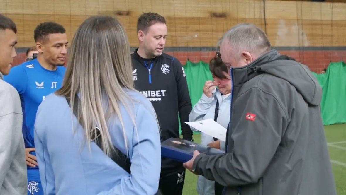 Michael Beale and James Tavernier awarded the family free season tickets.