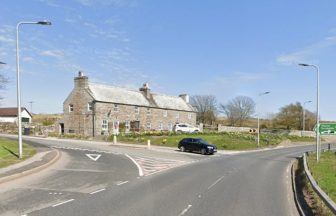 Teenager in hospital after crash between car and lorry at A9 junction in Highland village