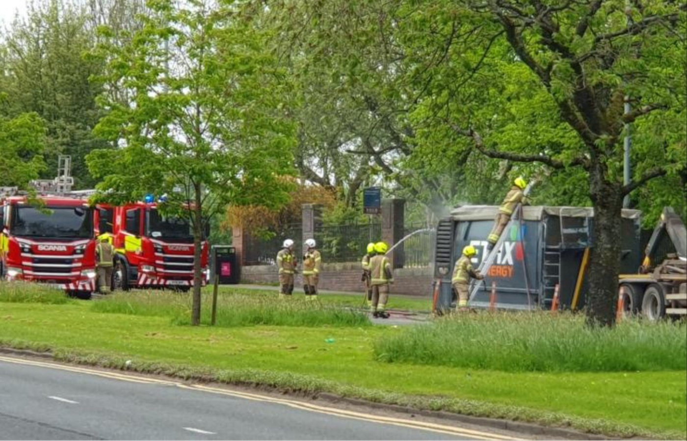 Glasgow fire crews tackle woodchip trailer blaze near primary school on