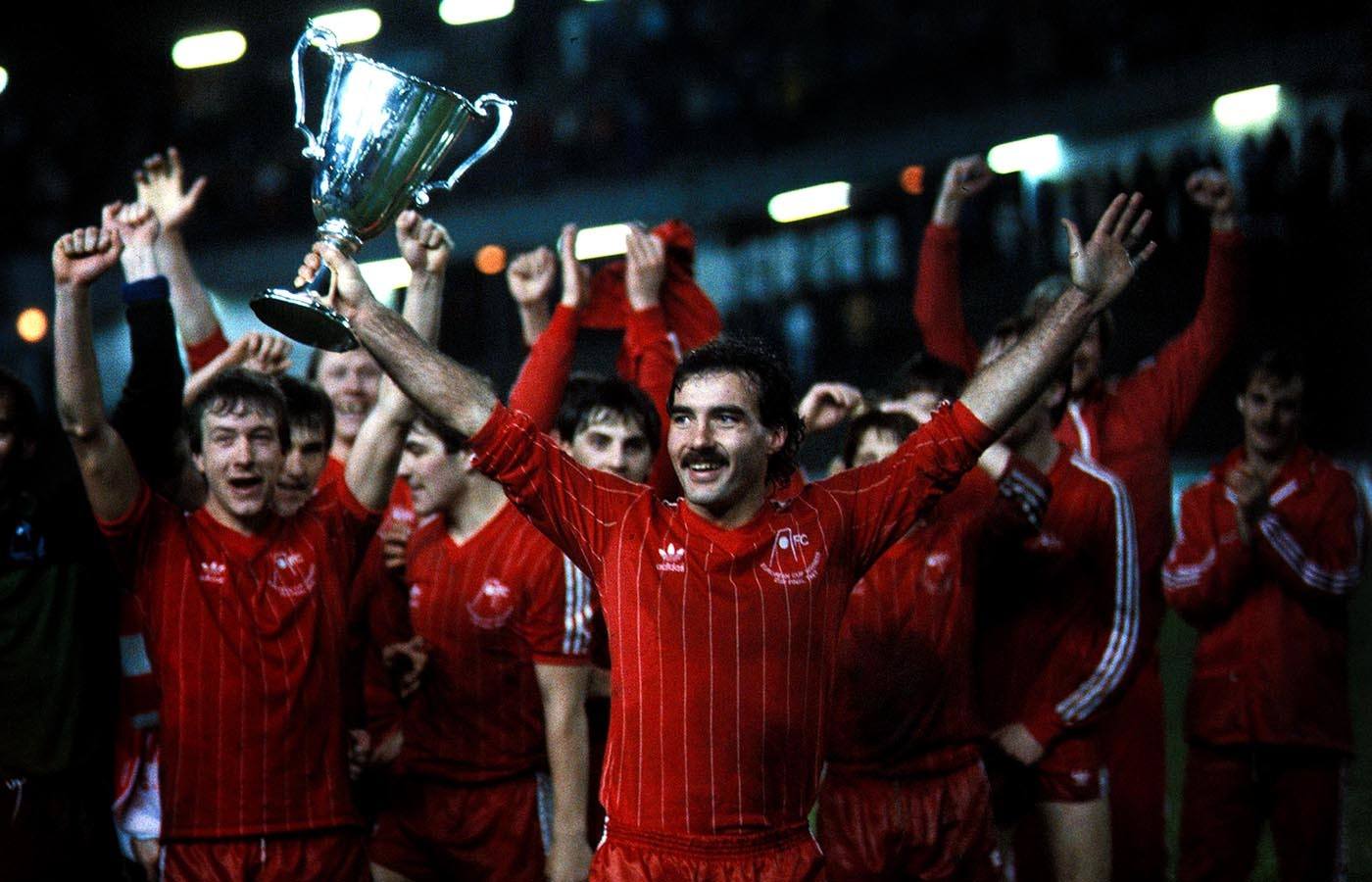 Willie Miller holds aloft the European Cup Winners' Cup.