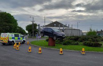 Stolen car found abandoned on metal drum in middle of Scott’s Street roundabout in Annan