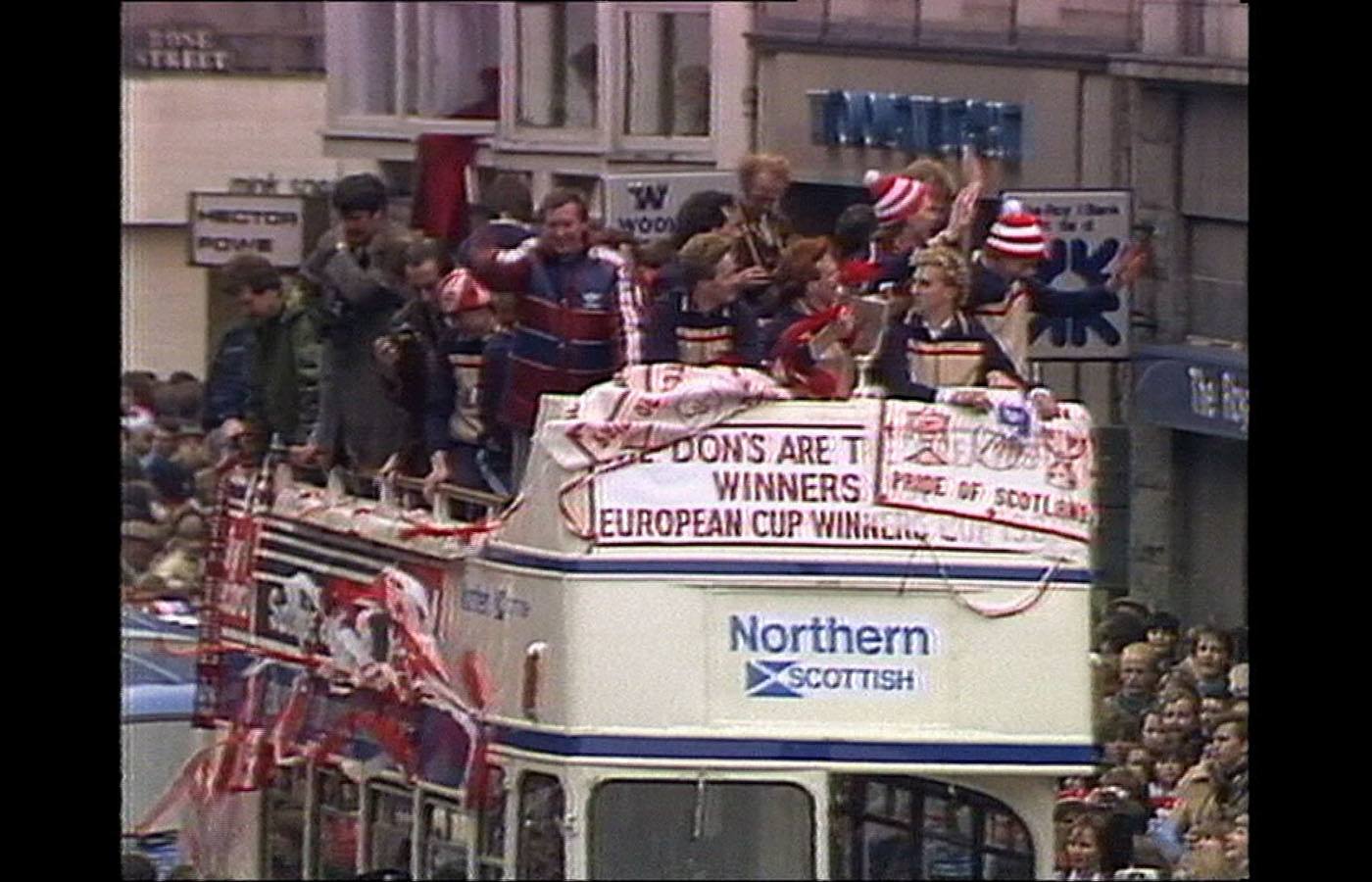 Aberdeen players during open-top bus parade.