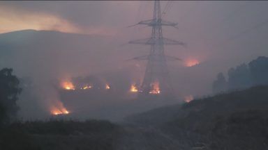 Emergency crews remain on site for one of largest ever wildfires