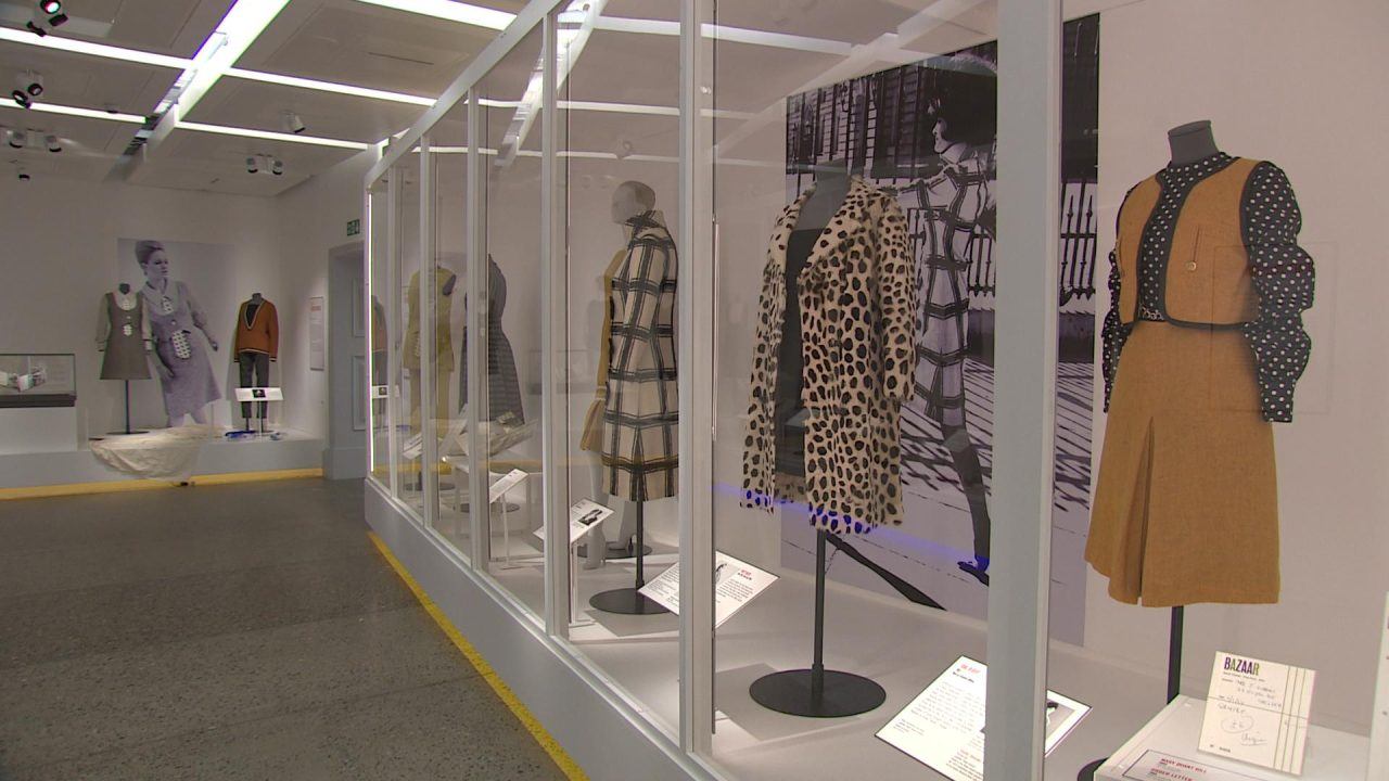 The exhibition features more than 100 garments, accessories, cosmetics and photographs.