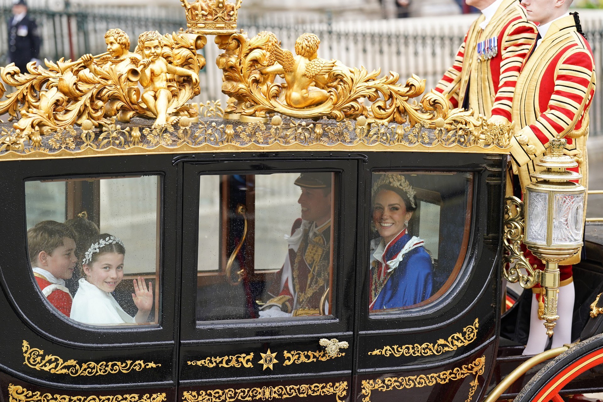 Prince George, Princess Charlotte and the Prince and Princess of Wales return to Buckingham Palace by coach following the coronation ceremony of King Charles III and Queen Camilla.