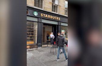 Firefighters tackle blaze after fire breaks out at Starbucks on Edinburgh’s Royal Mile