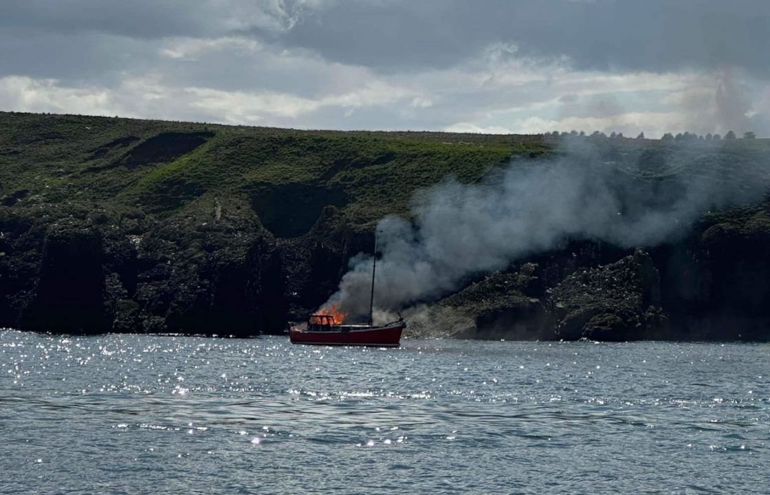RNLI rescue injured sailor after boat catches fire near historic Dunnottar castle in Stonehaven