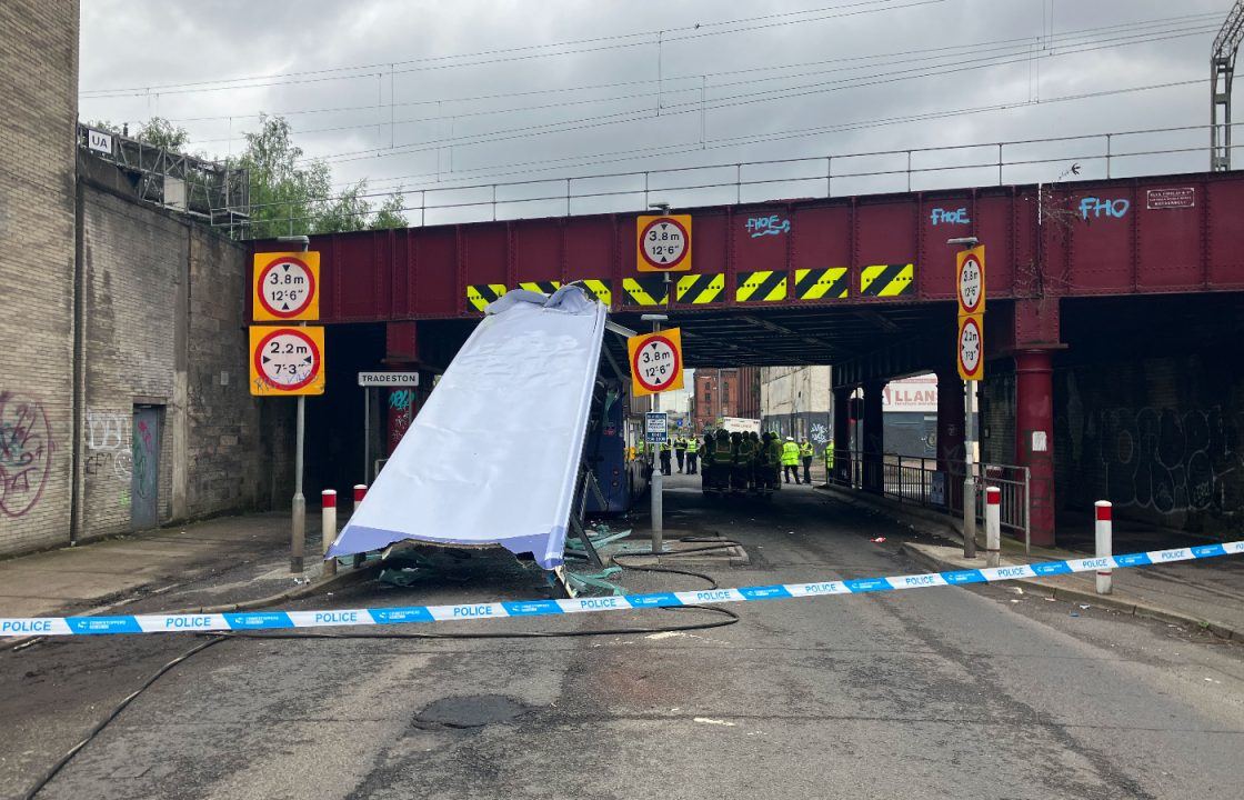 Investigations under way by Police Scotland and First after roof torn off bus in Glasgow bridge crash