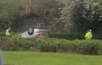 Person in hospital after car careers over wall and flips onto footpath in Inverkeithing, Fife