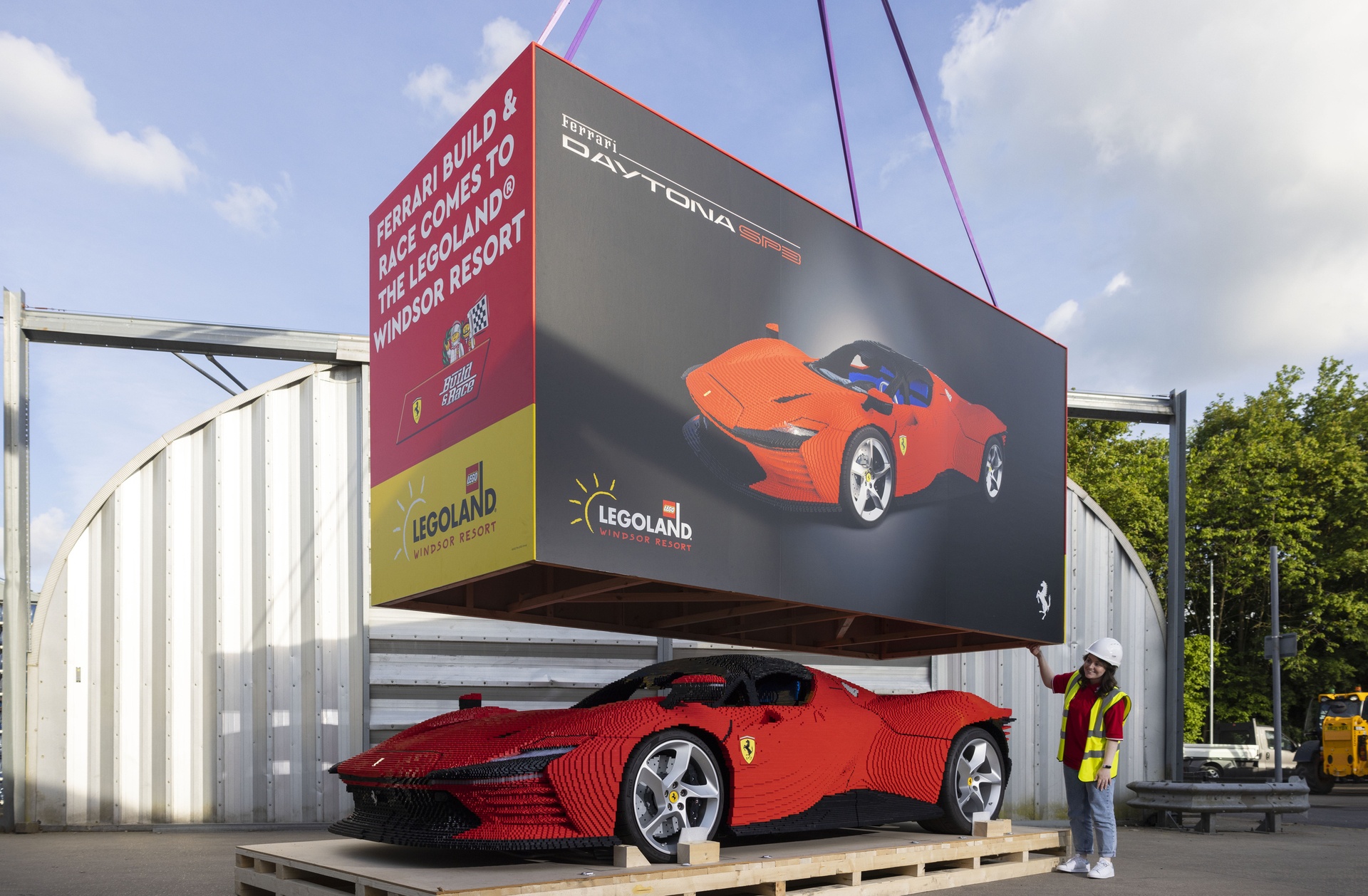 World's first life-sized Lego Ferrari Daytona SP3 made from 402,836 bricks, being 'unboxed' which will now go on permanent display at the theme park's latest attraction