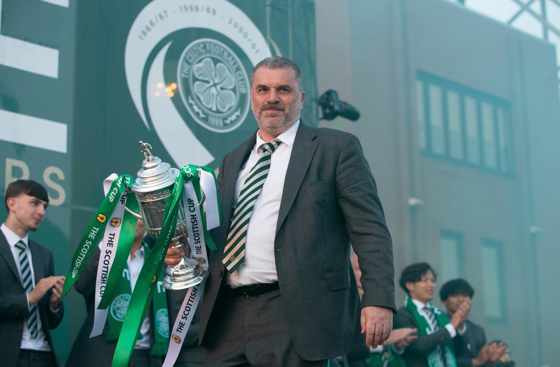 Ange Postecoglou as Celtic fans celebrate winning the Scottish Cup and completing the domestic treble at Celtic Park, on June 3.
