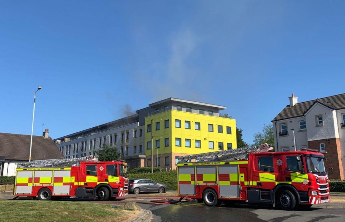 Firefighters work through night tackling blaze at block of flats in Edinburgh