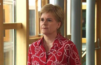 Former first minister Nicola Sturgeon returns to Scottish Parliament for first time since arrest