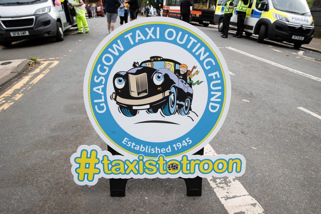 Children treated to day at the Troon seaside on 76th Glasgow Taxi Outing