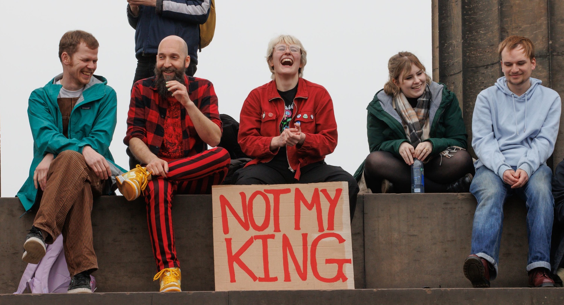 People take part in an anti-monarchy rally on Calton Hill, Edinburgh, following the coronation of King Charles and Queen Camilla.
