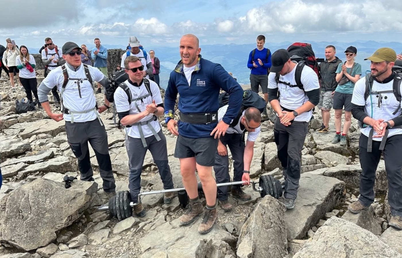 He reached the summit with the 100kg barbell after a climb of more than 16 hours