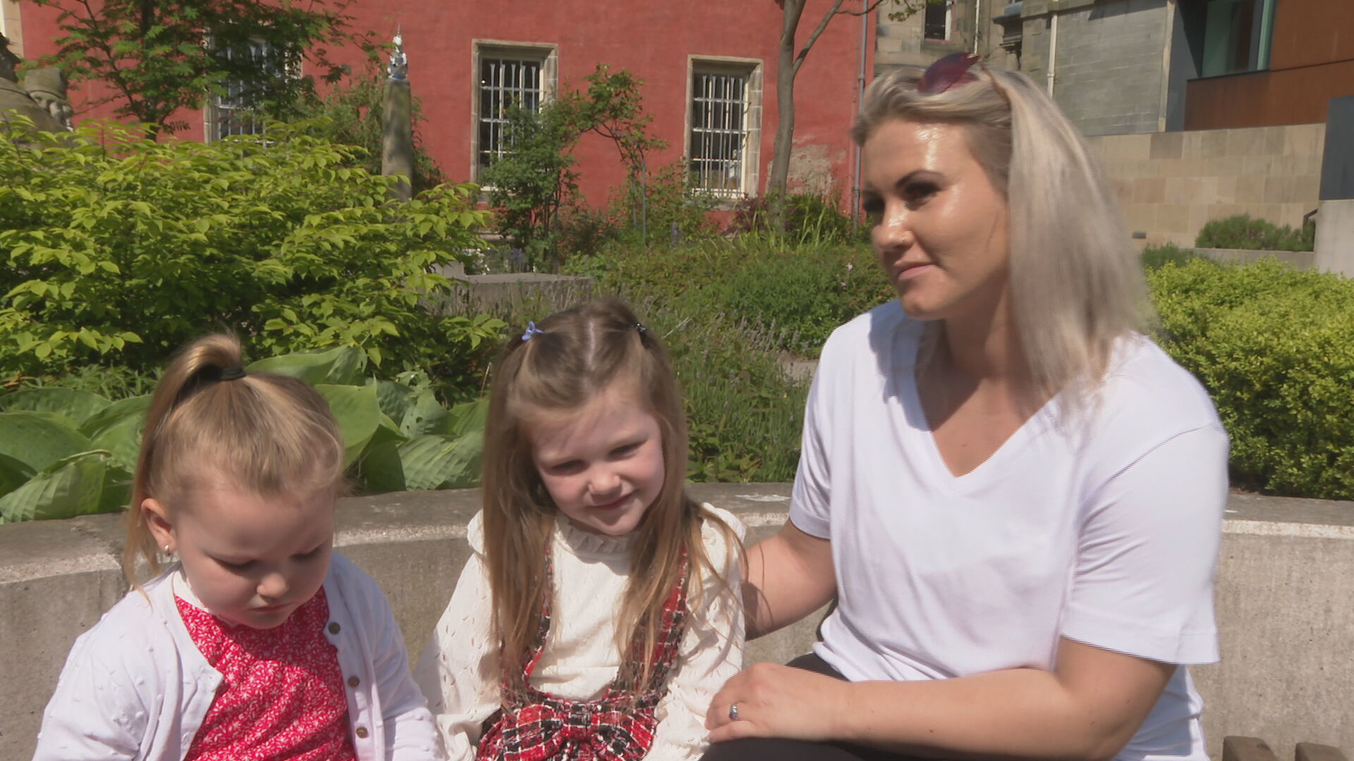 Mali, 3, and Kalea, 7, with mum, Laurisa.