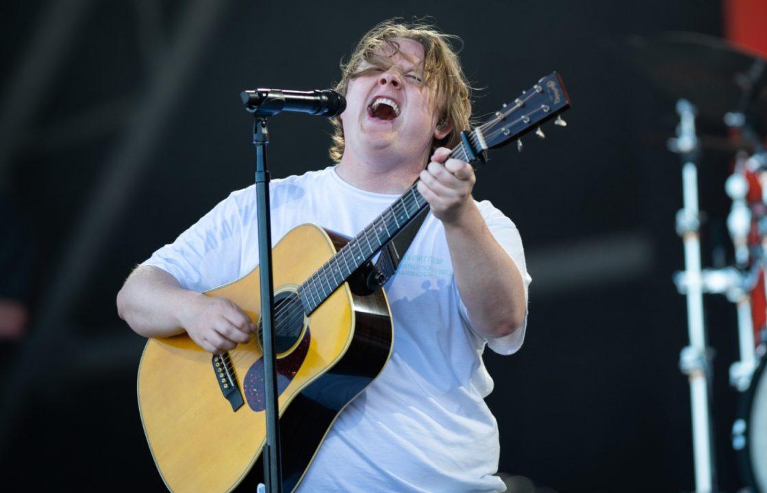 Lewis Capaldi cries and sweats while cursing out Ed Sheeran on Hot Ones