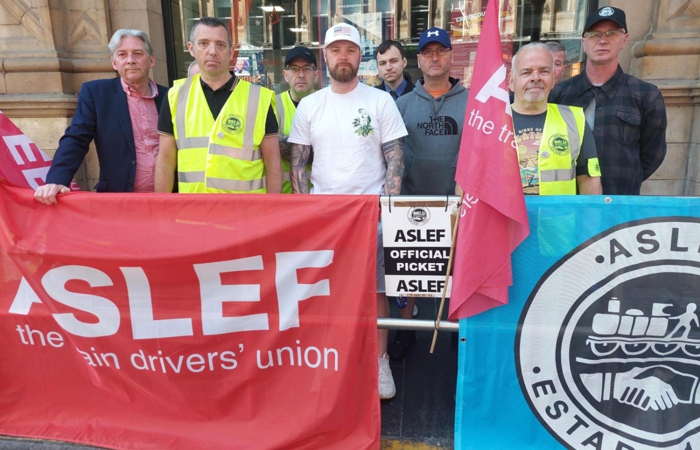 Members of Aslef union outside Glasgow's Central Station.