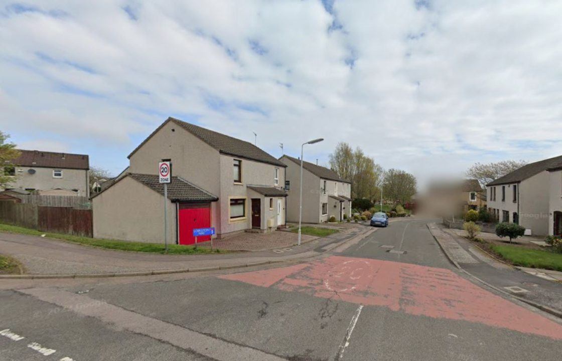 Man rushed to hospital as police investigate fire at home in Cove, Aberdeen