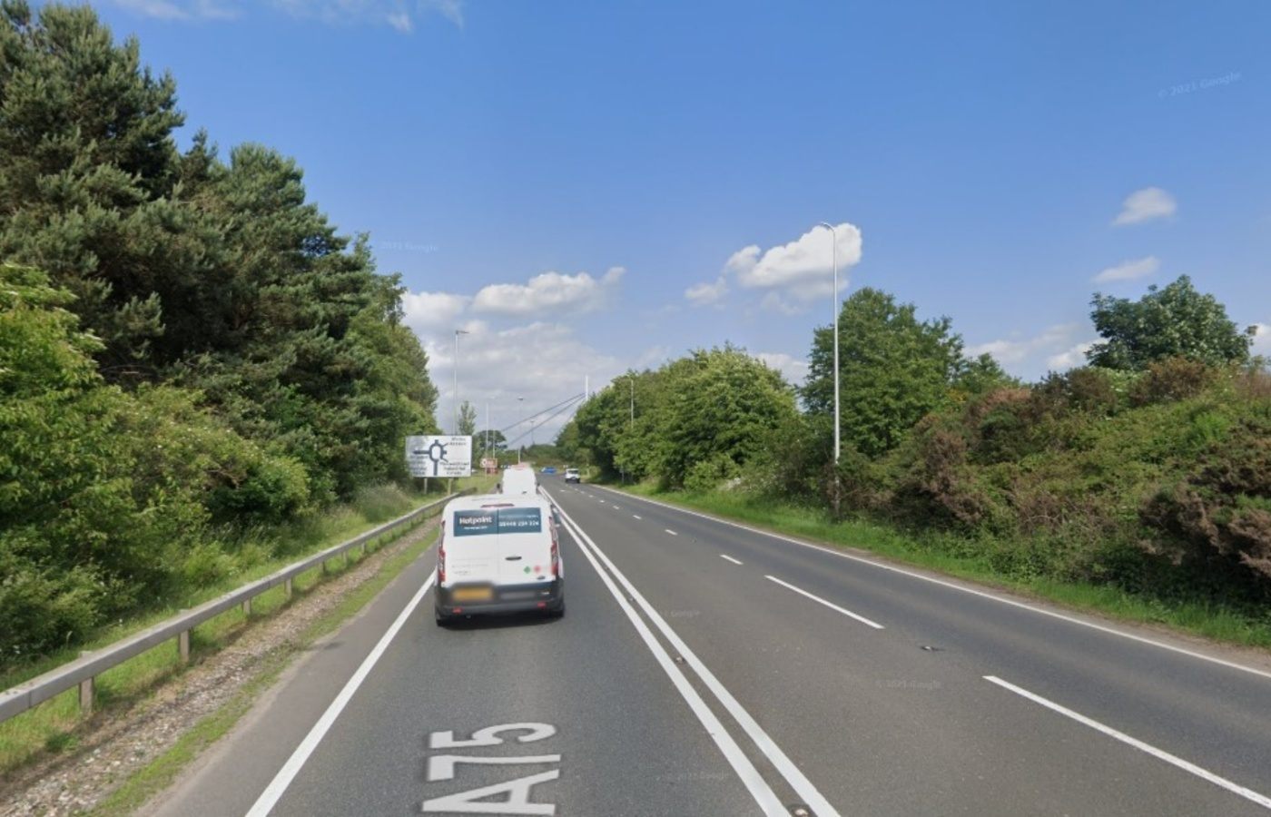 Man in hospital with serious injuries after car and JCB trailer