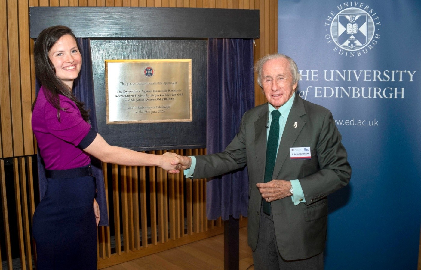 Dr Claire Durrant and Sir Jackie Stewart unveil a plaque celebrating the launch of the Dyson RAD Dementia Research Acceleration Project.