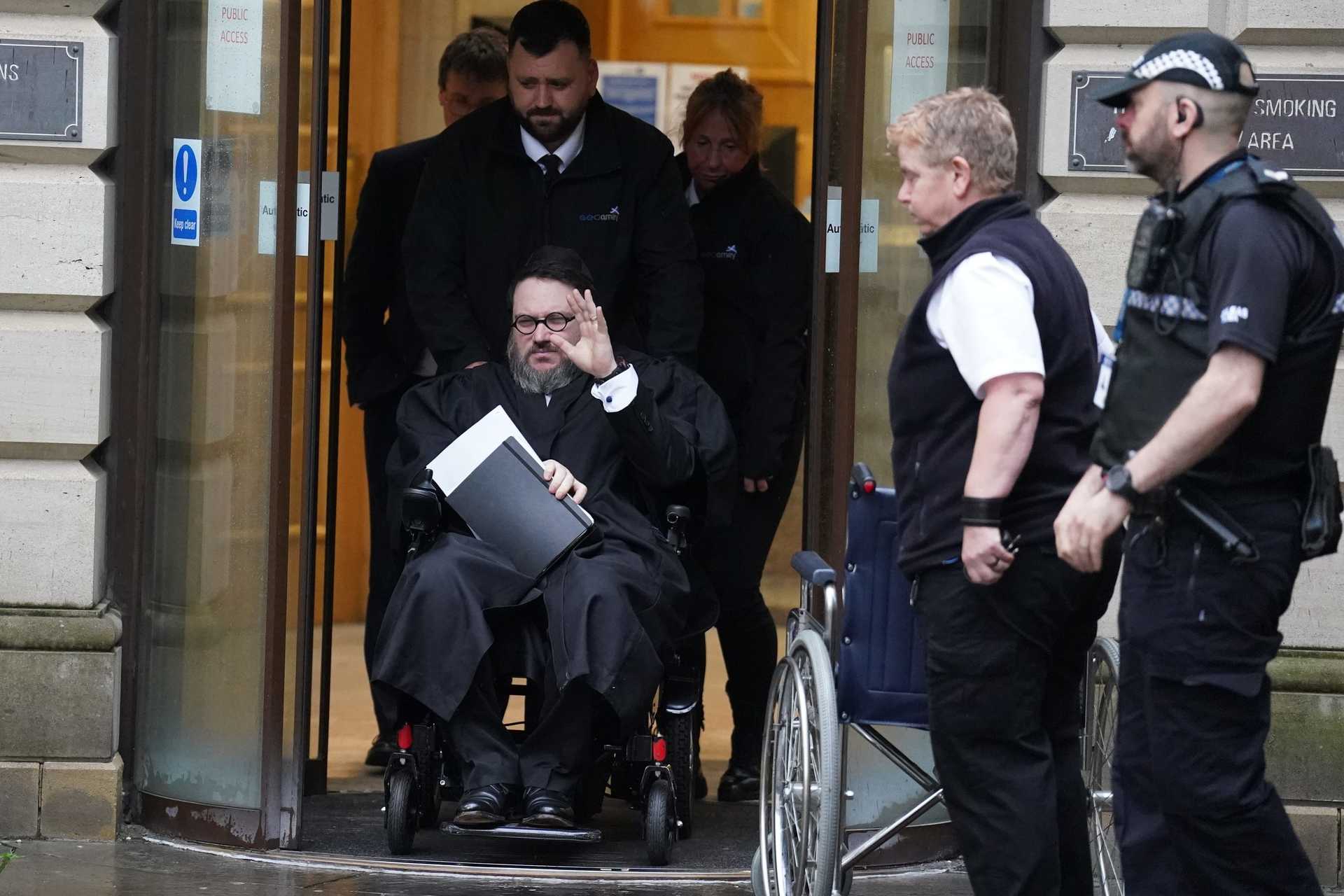 Nicholas Rossi leaves Edinburgh Sheriff Court after his extradition hearing.