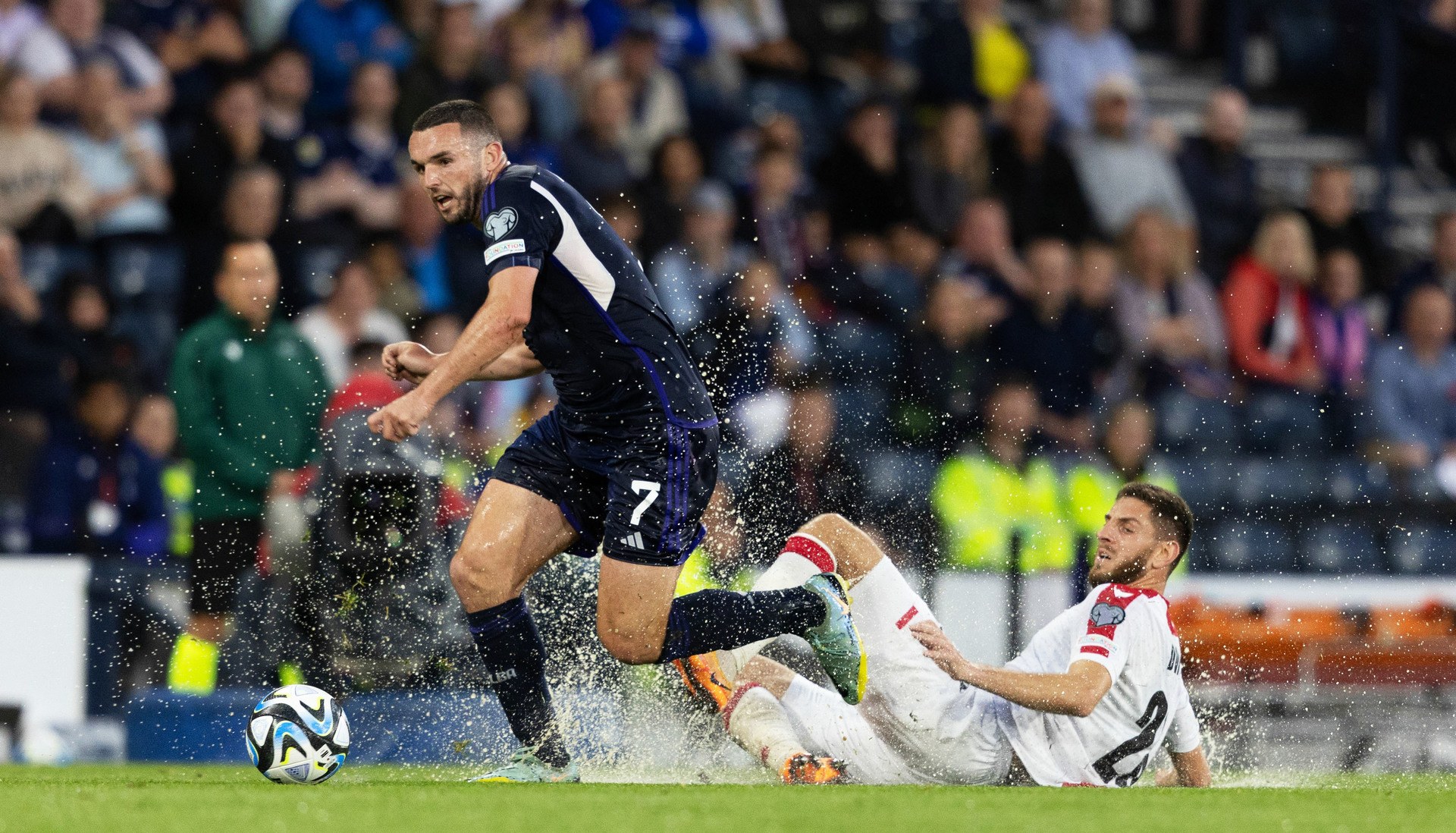 Torrential rain in Glasgow meant the opening exchanges were played in farcical conditions. (Photo by Craig Foy / SNS Group)