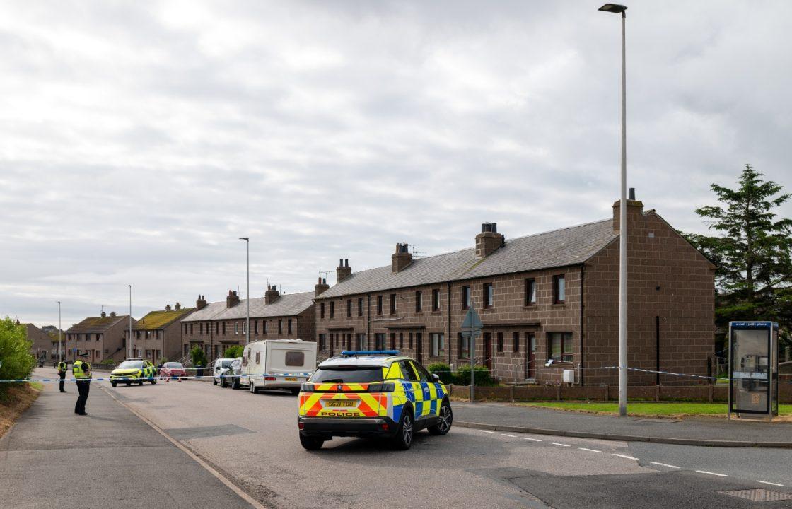 Man arrested after death of woman in Peterhead as police seal off Catto Drive